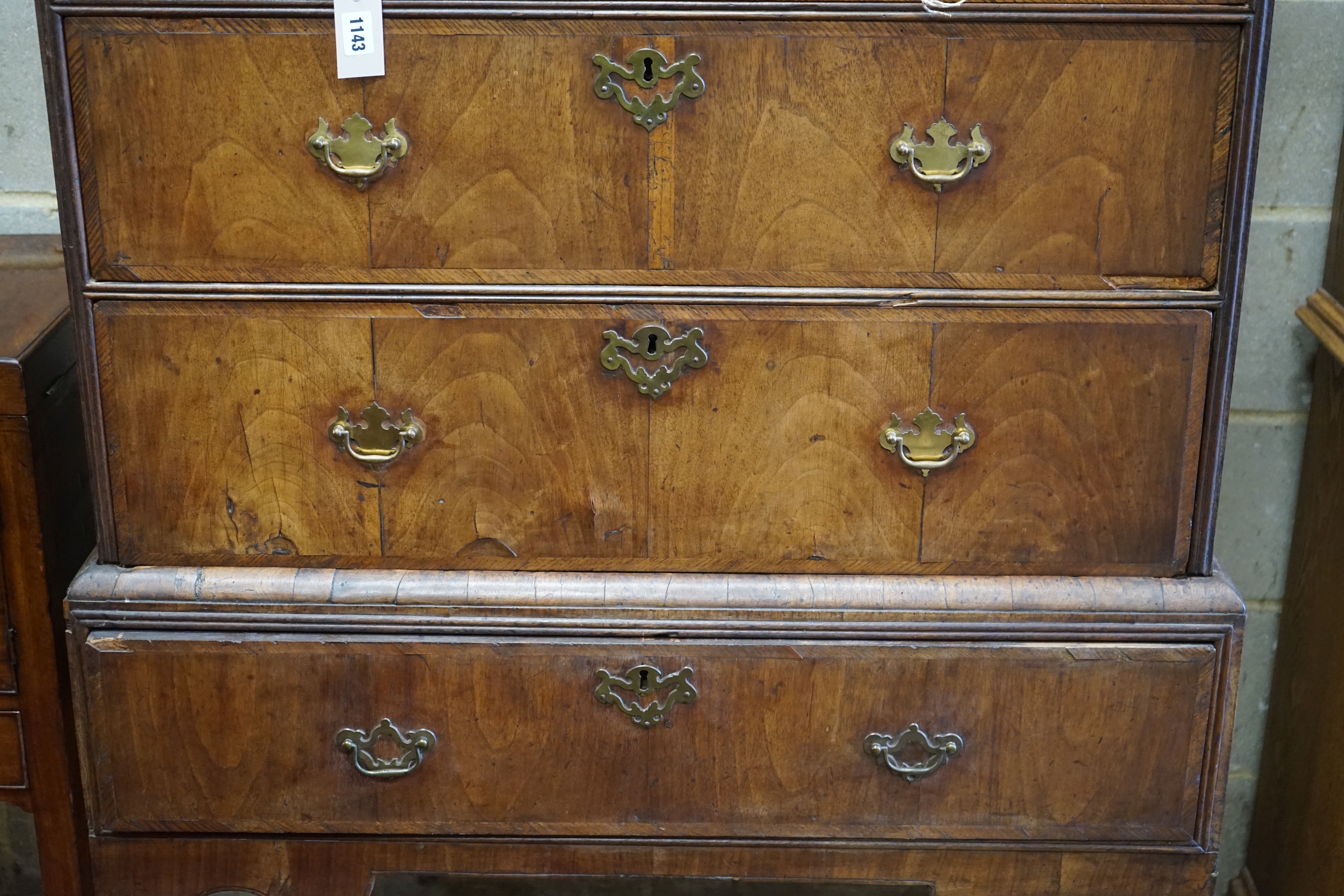 An 18th century banded walnut chest on stand, width 96cm, depth 57cm, height 153cm